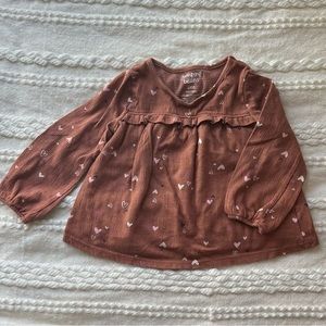 Brown/Rust colored long sleeve with hearts